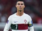FILE - Portugal's Cristiano Ronaldo pauses during the World Cup quarterfinal soccer match between Morocco and Portugal in Doha, Qatar, Dec. 10, 2022. New Portugal coach Roberto Martínez included Cristiano Ronaldo on his first squad list since taking over from Fernando Santos following the World Cup on Friday, March 17, 2023. (AP Photo/Petr David Josek, File) FILE - Portugal's Cristiano Ronaldo pauses during the World Cup quarterfinal soccer match between Morocco and Portugal in Doha, Qatar, Dec. 10, 2022. New Portugal coach Roberto Martínez included Cristiano Ronaldo on his first squad list since taking over from Fernando Santos following the World Cup on Friday, March 17, 2023. (AP Photo/Petr David Josek, File)