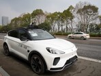 A car of Baidu's driverless robotaxi service Apollo Go is seen on a road in Wuhan, Hubei province, China.