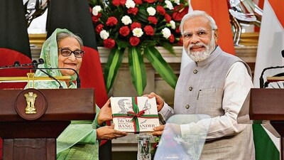 India-Bangladesh friendship pipeline: Bangladesh PM Sheikh Hasina and PM Modi are seen in this file photo. (PTI) India-Bangladesh friendship pipeline: Bangladesh PM Sheikh Hasina and PM Modi are seen in this file photo. (PTI)