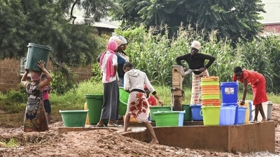 Women collect water near a displacement centre in Blantyre, southern Malawi on March 17. Both nations, Malawi and Mozambique were already facing a cholera outbreak before the cyclone hit and there are fears that the flooding could worsen the spread of water-borne diseases, reported AP. (Thoko Chikondi / AP) Women collect water near a displacement centre in Blantyre, southern Malawi on March 17. Both nations, Malawi and Mozambique were already facing a cholera outbreak before the cyclone hit and there are fears that the flooding could worsen the spread of water-borne diseases, reported AP. (Thoko Chikondi / AP)