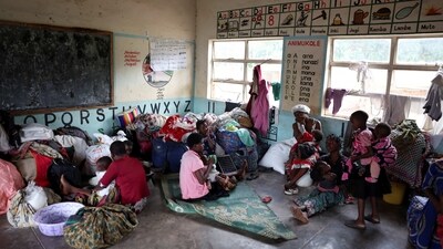 Displaced flood victims from the Chiradzulu district rest at Montfort Primary School which is used for temporary shelter after their homes were damaged by mudslides and rockfalls in the aftermath of Cyclone Freddy, on March 16. (Esa Alexander / Reuters) Displaced flood victims from the Chiradzulu district rest at Montfort Primary School which is used for temporary shelter after their homes were damaged by mudslides and rockfalls in the aftermath of Cyclone Freddy, on March 16. (Esa Alexander / Reuters)
