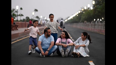 A family enjoys a day out at Lucknow’s Marine Drive as the weather took a pleasant turn on Friday (Deepak Gupta/HT)