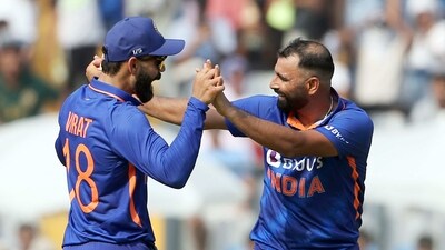 Mumbai, Mar 17 (ANI): India's Mohammed Shami and Virat Kohli celebrate the dismissal of Australia's Cameron Green during the 1st ODI match between India and Australia, at Wankhede Stadium, in Mumbai on Friday. (ANI Photo) (ANI) Mumbai, Mar 17 (ANI): India's Mohammed Shami and Virat Kohli celebrate the dismissal of Australia's Cameron Green during the 1st ODI match between India and Australia, at Wankhede Stadium, in Mumbai on Friday. (ANI Photo) (ANI)
