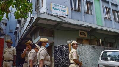 Bengaluru: Security personnel keep vigil outside the Popular Front of India (PFI) party office in Bengaluru, Thursday, Sept. 22, 2022. A multi-agency operation was spearheaded by the National Investigation Agency (NIA) on the PFI in 11 states for allegedly supporting terror activities in the country. (PTI Photo)(PTI09_22_2022_000059A) (PTI) Bengaluru: Security personnel keep vigil outside the Popular Front of India (PFI) party office in Bengaluru, Thursday, Sept. 22, 2022. A multi-agency operation was spearheaded by the National Investigation Agency (NIA) on the PFI in 11 states for allegedly supporting terror activities in the country. (PTI Photo)(PTI09_22_2022_000059A) (PTI)