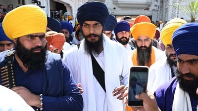 A video of Amritpal Singh in a vehicle as Punjab cops were chasing him on Saturday surfaced, courtesy his followers. (AFP) A video of Amritpal Singh in a vehicle as Punjab cops were chasing him on Saturday surfaced, courtesy his followers. (AFP)