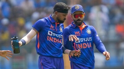 India's captain Hardik Pandya, left, chats with teammate Virat Kohli during the first one-day international cricket match between India and Australia, in Mumbai. (AP) India's captain Hardik Pandya, left, chats with teammate Virat Kohli during the first one-day international cricket match between India and Australia, in Mumbai. (AP)