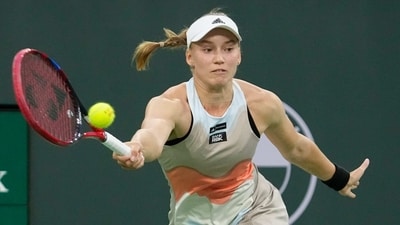 Elena Rybakina, of Kazakhstan, returns a shot to Iga Swiatek, of Poland, during a semifinal match at the BNP Paribas Open tennis tournament Friday, March 17, 2023, in Indian Wells, Calif. (AP Photo/Mark J. Terrill) (AP) Elena Rybakina, of Kazakhstan, returns a shot to Iga Swiatek, of Poland, during a semifinal match at the BNP Paribas Open tennis tournament Friday, March 17, 2023, in Indian Wells, Calif. (AP Photo/Mark J. Terrill) (AP)