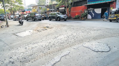 Mumbai, India - March 17, 2023: The entire newly repaired road is getting damaged and destroyed due to the negligence of heavy trucks carrying construction materials and debris at the sites, creating dust pollution and posing health issues and inconvenience to residents, at Khar, Pali Road, in Mumbai, India, on Friday, March 17, 2023. (Photo by Satish Bate/Hindustan Times) (Satish Bate/HT PHOTO) Mumbai, India - March 17, 2023: The entire newly repaired road is getting damaged and destroyed due to the negligence of heavy trucks carrying construction materials and debris at the sites, creating dust pollution and posing health issues and inconvenience to residents, at Khar, Pali Road, in Mumbai, India, on Friday, March 17, 2023. (Photo by Satish Bate/Hindustan Times) (Satish Bate/HT PHOTO)