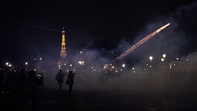 A protester shoots a firework, with the Eiffel tower seen in the background, during a demonstration on Place de la Concorde in Paris, the day after the French government pushed a pensions reform using the article 49.3 of the constitution. Travelling to Paris amid protests and strikes? Here's what to know (Photo by JULIEN DE ROSA / AFP) A protester shoots a firework, with the Eiffel tower seen in the background, during a demonstration on Place de la Concorde in Paris, the day after the French government pushed a pensions reform using the article 49.3 of the constitution. Travelling to Paris amid protests and strikes? Here's what to know (Photo by JULIEN DE ROSA / AFP)
