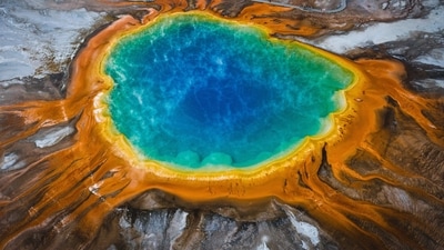 Grand Prismatic Spring: Located in Yellowstone National Park in the United States, this hot spring is the largest in the park and is known for its stunning rainbow colours caused by the presence of bacteria that thrive in its scorching waters. (Unsplash) Grand Prismatic Spring: Located in Yellowstone National Park in the United States, this hot spring is the largest in the park and is known for its stunning rainbow colours caused by the presence of bacteria that thrive in its scorching waters. (Unsplash)