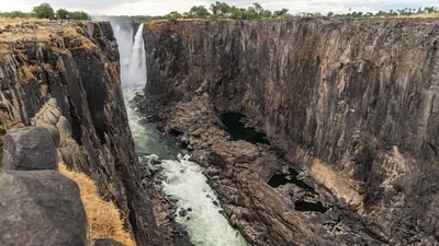 Victoria Falls: This massive waterfall on the border of Zambia and Zimbabwe is one of the largest in the world and is known for its thunderous roar and stunning rainbow displays. (AFP) Victoria Falls: This massive waterfall on the border of Zambia and Zimbabwe is one of the largest in the world and is known for its thunderous roar and stunning rainbow displays. (AFP)