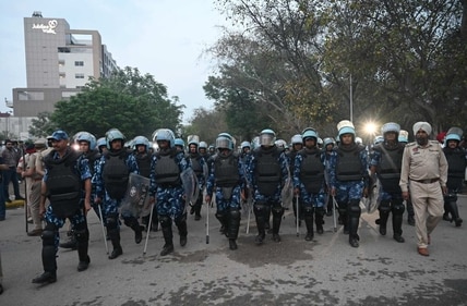 Rapid Action Force at the protest site at Airport Road which Nihangs blocked in protest. (Ravi Kumar/HT) Rapid Action Force at the protest site at Airport Road which Nihangs blocked in protest. (Ravi Kumar/HT)