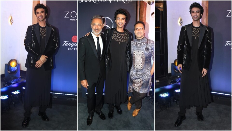 Babil Khan poses with designers Shantanu and Nikhil. (HT Photo/Varinder Chawla)