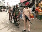 Paramilitary personnel stand guard at Mehatpur village after the arrest of associates of Waris Punjab De chief Amritpal Singh in Jalandhar on Saturday. 