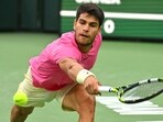 Indian Wells, CA, USA; Carlos Alcaraz (ESP) hits a shot in the semi-final match defeating Jannik Sinner (ITA) in the BNP Paribas Open at the Indian Wells Tennis Garden