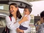 Actor Kajal Aggarwal with son Neil at Mumbai airport. (Viral Bhayani)