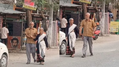 The image, taken from the viral video, shows an elderly couple walking on the road. (Instagram/@jenifarrrrahman) The image, taken from the viral video, shows an elderly couple walking on the road. (Instagram/@jenifarrrrahman)
