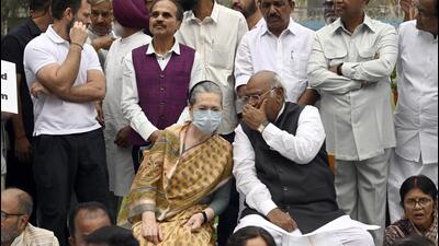 Leader of Opposition in Rajya Sabha Mallikarjun Kharge and former Congress president Sonia Gandhi with Rahul Gandhi and other opposition leaders during a protest against the Adani Group at Parliament House complex in New Delhi on March 17. (Sanjeev Verma/HT Photo)