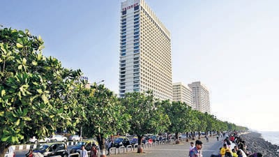 Mumbai, India - March 18, 2023: Trees adjacent to Trident, NCPA Apartment and NCPA, at Nariman Point, in Mumbai, India, on Saturday, March 18, 2023. (Photo by Anshuman Poyrekar/ Hindustan Times) (Anshuman Poyrekar/HT PHOTO) Mumbai, India - March 18, 2023: Trees adjacent to Trident, NCPA Apartment and NCPA, at Nariman Point, in Mumbai, India, on Saturday, March 18, 2023. (Photo by Anshuman Poyrekar/ Hindustan Times) (Anshuman Poyrekar/HT PHOTO)