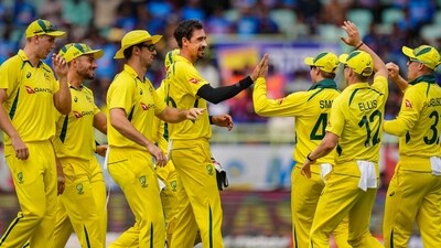 Mitchell Starc celebrates with teammates after the wicket of Indian batter Rohit Sharma during the second ODI cricket match between India and Australia, (PTI) Mitchell Starc celebrates with teammates after the wicket of Indian batter Rohit Sharma during the second ODI cricket match between India and Australia, (PTI)