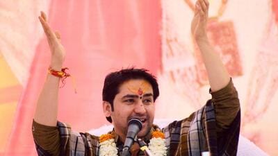 Prayagraj, Feb 03 (ANI): A combination of photos showing Spiritual leader, Dhirendra Krishna Shastri addressing the 'Divya Darbaar' programme at Meja village, in Prayagraj on Thursday. (ANI Photo) (Nitin Sharma) Prayagraj, Feb 03 (ANI): A combination of photos showing Spiritual leader, Dhirendra Krishna Shastri addressing the 'Divya Darbaar' programme at Meja village, in Prayagraj on Thursday. (ANI Photo) (Nitin Sharma)