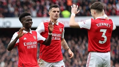 Arsenal's Bukayo Saka celebrates scoring their fourth goal with Kieran Tierney and Granit Xhaka (REUTERS)