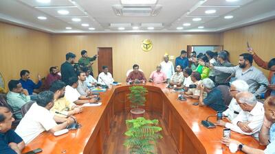 UP energy minister AK Sharma with Sangharsh Samiti convenor Shailendra Dubey and others in a meeting in Lucknow on Sunday. (SOURCED) UP energy minister AK Sharma with Sangharsh Samiti convenor Shailendra Dubey and others in a meeting in Lucknow on Sunday. (SOURCED)