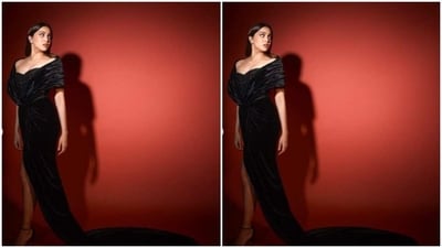 Sharvari’s gown came with a black laced corset featuring embroidery work in black resham threads. The black satin gown featured dramatic wrap sleeves, a cascading long train, and a high thigh slit.&nbsp; (Instagram/@sharvari)