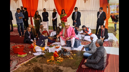 Jammu and Kashmir Lt Governor Manoj Sinha performs 'bhoomi pujan' during foundation stone laying of mall by Dubai's Emaar Group, at Sempora on the outskirts of Srinagar on Sunday. (PTI)