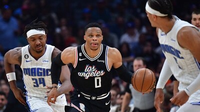 Los Angeles Clippers guard Russell Westbrook (0) moves the ball up court against Orlando Magic center Wendell Carter Jr. (34) and forward Paolo Banchero (5) during the first half at Crypto.com Arena. (USA TODAY Sports)