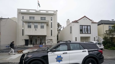 Raising pro-Khalistan slogans, the protesters on Sunday broke open the makeshift security barriers raised by the city police and installed two so-called Khalistani flags inside the Consulate premises. (AP) Raising pro-Khalistan slogans, the protesters on Sunday broke open the makeshift security barriers raised by the city police and installed two so-called Khalistani flags inside the Consulate premises. (AP)