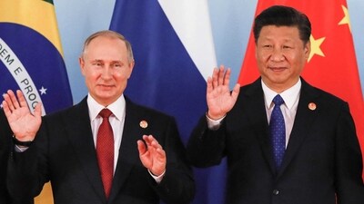 Russia's President Vladimir Putin (L) and China's President Xi Jinping. (AFP) Russia's President Vladimir Putin (L) and China's President Xi Jinping. (AFP)