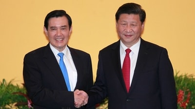 Former Taiwanese President with China's Xi Jinping. (AP) Former Taiwanese President with China's Xi Jinping. (AP)