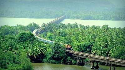 Konkan Railway: This 741-kilometer long railway line runs along the Konkan coast of Maharashtra, Goa, and Karnataka. The train passes through picturesque valleys, verdant hills, and the Arabian Sea, offering stunning views of the coastline. (Pinterest) Konkan Railway: This 741-kilometer long railway line runs along the Konkan coast of Maharashtra, Goa, and Karnataka. The train passes through picturesque valleys, verdant hills, and the Arabian Sea, offering stunning views of the coastline. (Pinterest)
