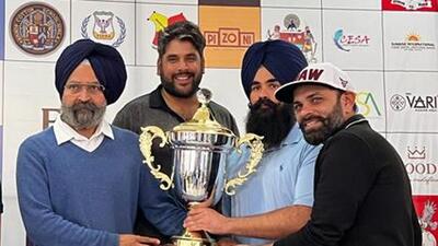 Members of the winning St John’s Old Boys Association team posing with the Inter-Alumni Golf Tournament trophy at the Panchkula Golf Club. (HT Photo)