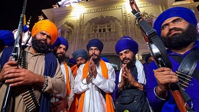'Waris Punjab De' founder Amritpal Singh with his associate Lovepreet Toofan offers prayers at Golden Temple after the latter's release from the Amritsar Central Jail in Amritsar February 24, (PTI) 'Waris Punjab De' founder Amritpal Singh with his associate Lovepreet Toofan offers prayers at Golden Temple after the latter's release from the Amritsar Central Jail in Amritsar February 24, (PTI)