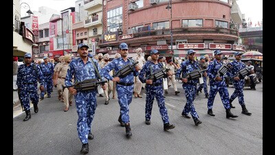 Police and Rapid Action Force (RAF) personnel conduct a flag march, Amritsar. March 19, 2023 (Raminder Pal Singh) Police and Rapid Action Force (RAF) personnel conduct a flag march, Amritsar. March 19, 2023 (Raminder Pal Singh)