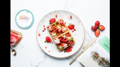 Waffles with fresh strawberries and whipped cream on top are a classic choice (Love&Cheesecake) Waffles with fresh strawberries and whipped cream on top are a classic choice (Love&Cheesecake)