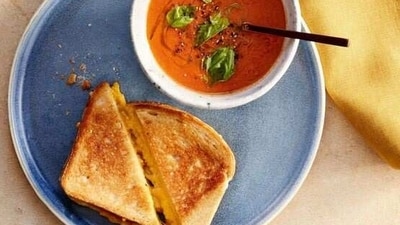 Grilled cheese sandwich and tomato soup: There is something undeniably comforting about a classic grilled cheese sandwich and a steaming bowl of tomato soup. The combination of melted cheese and tangy tomato flavoeurs is perfect for a rainy day. For an extra indulgent twist, try adding bacon or avocado to your sandwich. (Pinterest)