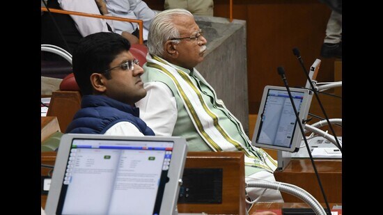 Haryana chief minister Manohar Lal Khattar and deputy CM Dushyant Chautala during the question hour in the ongoing budget session at Haryana Vidhan Sabha in Chandigarh on Monday. (Keshav Singh/HT)