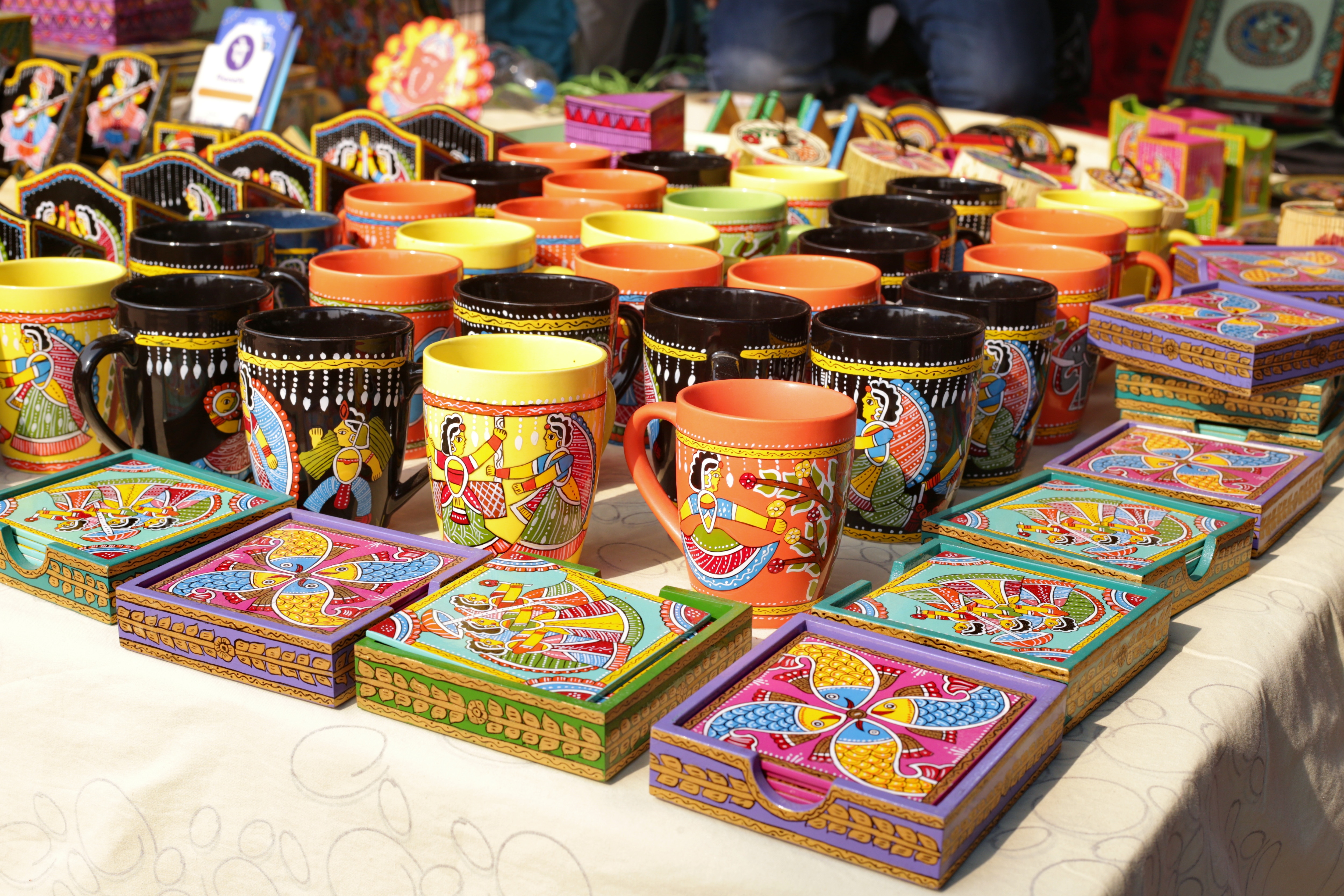 Mugs ( ₹300 each) and packs of six coasters ( ₹700 each) with Madhubani prints at stall 88. Mugs ( ₹300 each) and packs of six coasters ( ₹700 each) with Madhubani prints at stall 88.