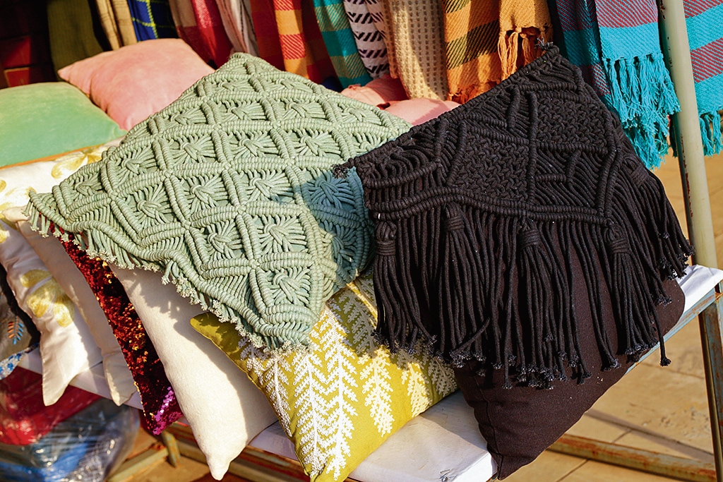 The macrame cushion covers have turned out to be a fav among shoppers at this haat. Price:  ₹200- ₹650