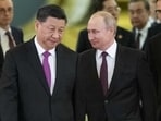 Chinese President Xi Jinping, left, and Russian President Vladimir Putin enter a hall for talks in the Kremlin in Moscow, Russia, June 5, 2019. (AP)