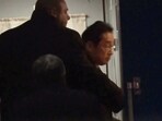 Japanese Prime Minister Fumio Kishida gets on train in Przemysl, Poland, heading to Kyiv. (NTV via AP)