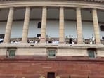 Opposition MPs protest on the first floor of the Parliament demanding a joint parliamentary committee (JPC) probe into the Adani Group issue during the Budget Session, in New Delhi, Tuesday, March 21, 2023. (PTI Photo) Opposition MPs protest on the first floor of the Parliament demanding a joint parliamentary committee (JPC) probe into the Adani Group issue during the Budget Session, in New Delhi, Tuesday, March 21, 2023. (PTI Photo)