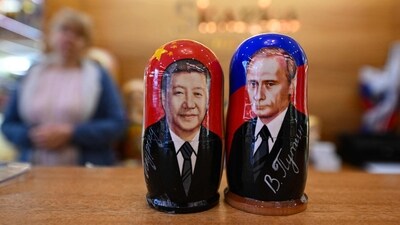 This picture from March 20 shows traditional Russian wooden nesting dolls, called Matryoshka dolls, depicting Chinese President Xi Jinping and Russian President Vladimir Putin at a gift shop in central Moscow. The Kremlin said that the leaders held a "thorough" exchange of views during their first day of talks and had discussed Beijing's peace plan for Ukraine- a 12-point paper calling for a de-escalation and eventual ceasefire in Ukraine, Reuters reported. ( Natalia Kolesnikova / AFP) This picture from March 20 shows traditional Russian wooden nesting dolls, called Matryoshka dolls, depicting Chinese President Xi Jinping and Russian President Vladimir Putin at a gift shop in central Moscow. The Kremlin said that the leaders held a "thorough" exchange of views during their first day of talks and had discussed Beijing's peace plan for Ukraine- a 12-point paper calling for a de-escalation and eventual ceasefire in Ukraine, Reuters reported. ( Natalia Kolesnikova / AFP)