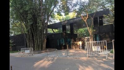 Around 2,500 disciples from across the globe gathered at the Osho Ashram entrance marking the 70th enlightenment day of Osho. (HT PHOTO) Around 2,500 disciples from across the globe gathered at the Osho Ashram entrance marking the 70th enlightenment day of Osho. (HT PHOTO)