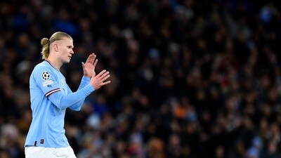 Manchester City's Norwegian striker Erling Haaland applauds the fans as he leaves the pitch after being substituted off during the UEFA Champions League round of 16 second-leg football match between Manchester City and RB Leipzig at the Etihad Stadium in Manchester, north west England, on March 14, 2023. (Photo by Oli SCARFF / AFP) (AFP) Manchester City's Norwegian striker Erling Haaland applauds the fans as he leaves the pitch after being substituted off during the UEFA Champions League round of 16 second-leg football match between Manchester City and RB Leipzig at the Etihad Stadium in Manchester, north west England, on March 14, 2023. (Photo by Oli SCARFF / AFP) (AFP)