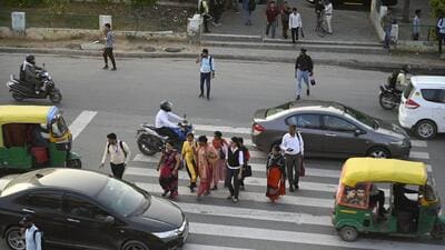 Gurugram, India-March 21, 2023: Pedestrian crossing the National Highway-48 at Shankar Chowk; GMDA will revamp Shankar Chowk for pedestrian safety and to analyse fatalities at Udyog Vihar near Cyber city, in Gurugram, India, on Tuesday, 21 March 2023. (Photo by Parveen Kumar/Hindustan Times)(Pic to go with Leena Dhankar's story) Gurugram, India-March 21, 2023: Pedestrian crossing the National Highway-48 at Shankar Chowk; GMDA will revamp Shankar Chowk for pedestrian safety and to analyse fatalities at Udyog Vihar near Cyber city, in Gurugram, India, on Tuesday, 21 March 2023. (Photo by Parveen Kumar/Hindustan Times)(Pic to go with Leena Dhankar's story)