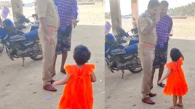 A screengrab from the video shared by Kerala Police. It shows a girl greeting a cop with a salute. (Instagram/@Kerala Police) A screengrab from the video shared by Kerala Police. It shows a girl greeting a cop with a salute. (Instagram/@Kerala Police)